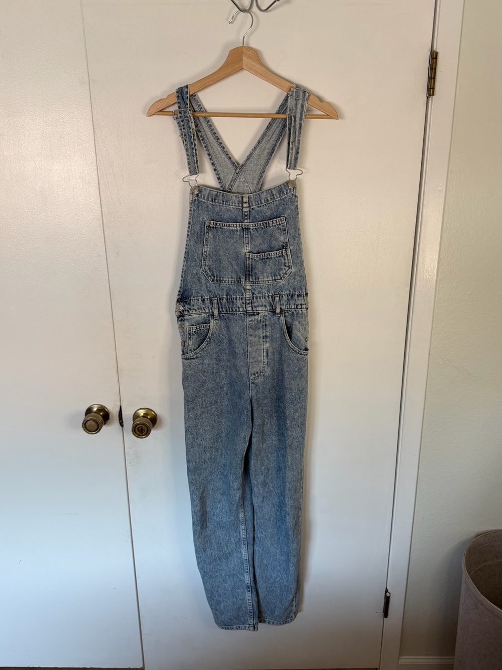 Free people light wash overalls